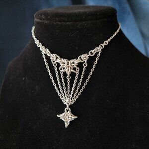 Silver shooting star necklace with a small silver chain